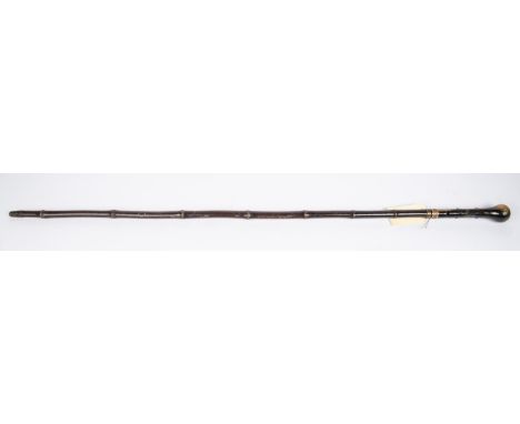 A 19th century bamboo swordstick, 27" diamond section blade with traces of blued decoration, knobbly bulbous horn handle with