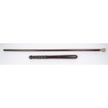 A Victorian gentleman's cane, 36" with white metal top and brass ferrule; also a police hardwood