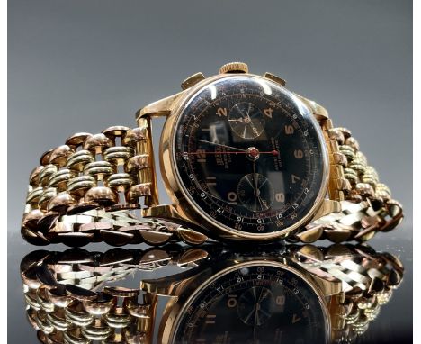 An 18ct gold cased Egona chronographe black dial wristwatch diameter 37.5mm 64.7gm including gilt bracelet.
The Phil Wadswort