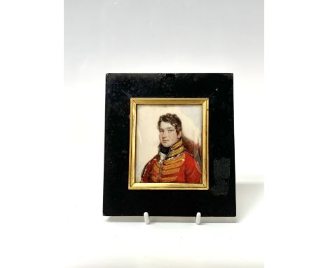 A Georgian portrait of a young army officer 8.5x7.5cm Condition: Split to right hand edge, varnish or glue trail at lower mar
