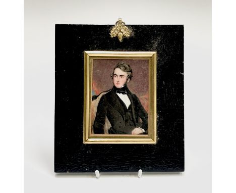 A miniature portrait of a seated Victorian young gentleman 10x7.5cm Condition: Not examined out of the frame but there seems 