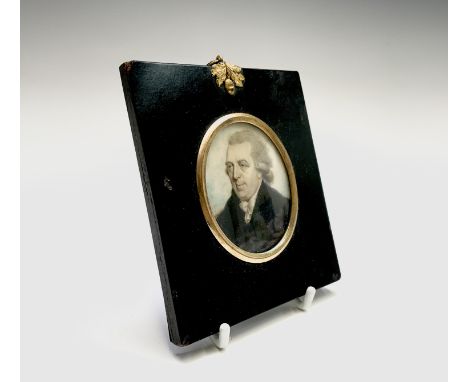 A portrait of a bewigged gentleman with blue coat attributed to John Barry (fl. 1784 - 1827) 6.5x5cm Condition: No condition 