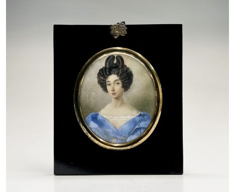 A miniature portrait of a Regency lady with outlandish coiffure 10x8.5cm oval Condition: Not examined out of the frame but it