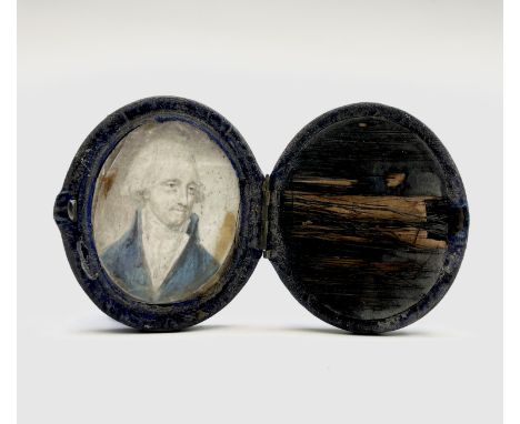 An 18th-century portrait of a gentleman with blue coat 5x4cm Blue velvet hinged case Condition: Case and miniature in poor co