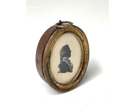 An 18th-century Naval Officer silhouette painted portrait heightened with white 4x3.5cm Condition: Foxing UK Postage: £15.04