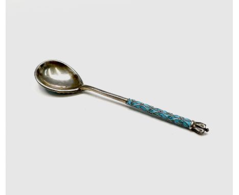 A Moscow silver-gilt and cloisonne spoon, makers mark W U ?, town and purity marks 11cm 17.4gm Most of the gilding has worn a