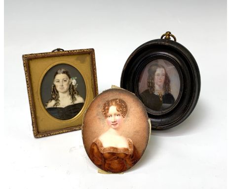 A Regency portrait of a young lady Indistinctly initialled and dated 8x7cm, a portrait of a young lady with lace collar and j