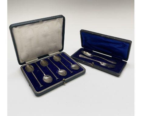 A set of six silver seal finial tea spoons by Cooper Brothers &amp; Sons Ltd Sheffield 1922 1.73oz, cased and an engraved fol