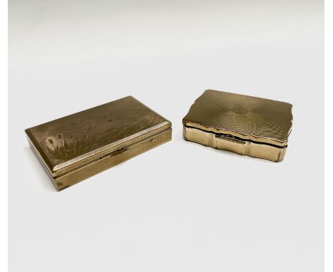 Two rectangular brass engined turned musical compacts by Stratton and Melissa. The Melissa compact decorated with a water sce