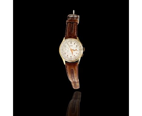 A Delbana 18ct gold chronograph wristwatch with 17 jewel movement Diameter 37.6mm 49.7gm including strap.
The Phil Wadsworth 