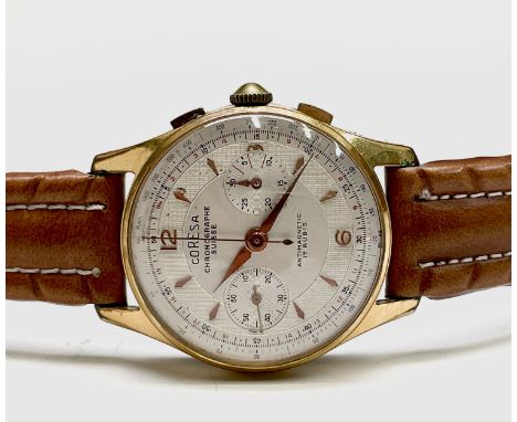 A Coresa gold plated chronograph wristwatch 36.8mm diameter 47.8gm including strap.
The Phil Wadsworth Watch Collection
Condi