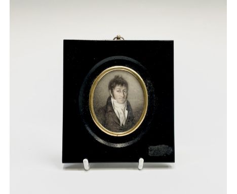 An early 19th-century portrait of a fashionable young gentleman 6.5x5cmNot examined out of the modern mount. Condition: No co