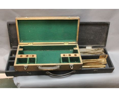 Two shooting related cases, one in light oak, opening to a green baize lined fitted interior, internal width 45 cm, the other