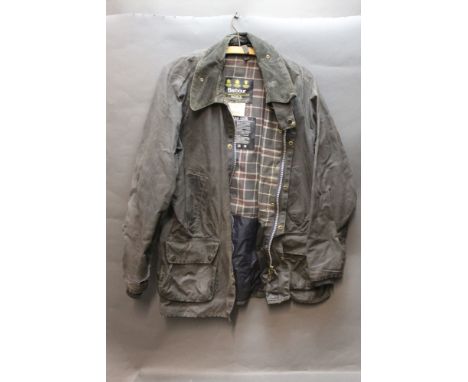 A Barbour Bedale waxed jacket, Size C44, together with an England's fly fishing waistcoat with integrated automatic buoyancy 