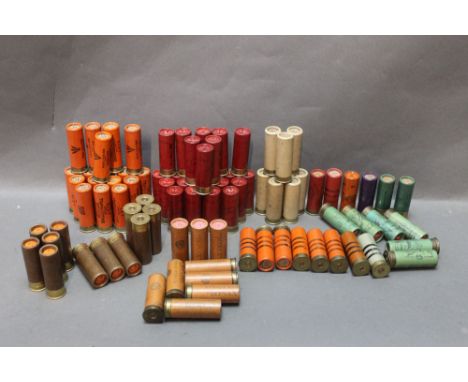 A collection of paper cased 12 bore cartridges, to include Eley trap shooting cartridges with broad arrow military stamp, Kyn