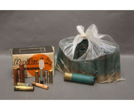 A box of vintage 12 bore Baikal shotgun cartridges (10), together with nine 410 and 9 mm cartridges, metallic and paper cases
