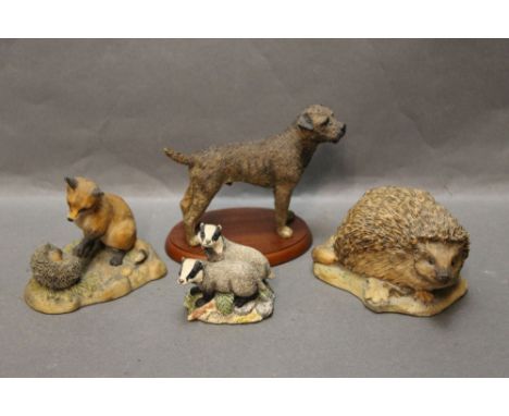 Four Border Fine Art figures, to include hedgehog, fox, terrier and pair of badgers titled "Forest Friends".