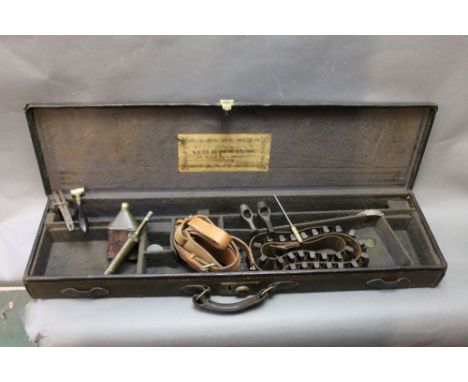 Army &amp; Navy London a canvas and leather trimmed shotgun motor case with space for 30" barrels, together with a quantity o