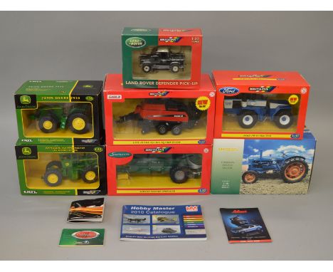 Seven boxed agricultural diecast models by Britains, Ertl and Universal Hobbies including a 1:16 scale UH Fordson Power Major