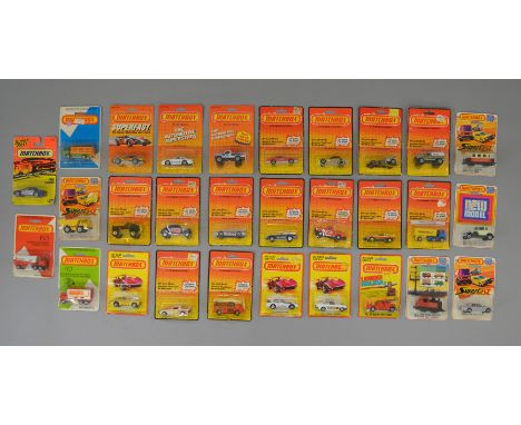 A quantity of  carded Matchbox Superfast and other small scale Matchbox diecast models,on various different styles of card pa