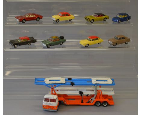 An unboxed Corgi Carrimore Tri-Deck Car Transporter together with eight unboxed Corgi cars including a 214 Ford Thunderbird i