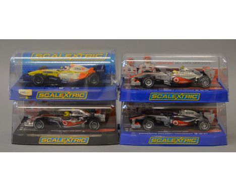 4 x Scalextric cars. C3043 Vodafone McLaren Mercedes Lewis Hamilton No.2 2010. C3046 Vodafone McLaren Mercedes Jenson Button 