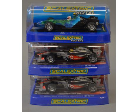 3 x Scalextric cars. C2840 Honda F1 No8. C3043 Vodafone McLaren Mercedes Lewis Hamilton No2 2010. C3046 Vodafone McLaren Merc