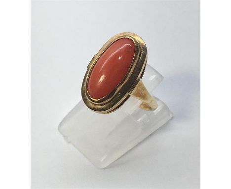 Vintage 14ct Gold Coral Ring hallmarked 585 set with large coral centre ..coral measures approx 14mm by 8mm weight of ring 4g
