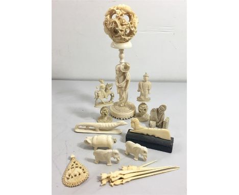 Selection of vintage ivory items to include puzzle balls ect 