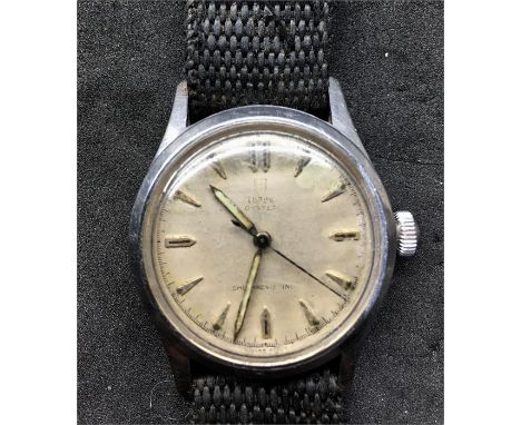Early Vintage Stainless Steel Rolex Tudor Oyster Wristwatch ..stainless steel case engraved on back glass scratched and marke