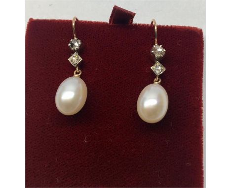 Pair of old cut Diamond & Pearl Drop Earrings each set with 2 old cut diamonds and large pearl drop ,set in 14ct  hallmarked 