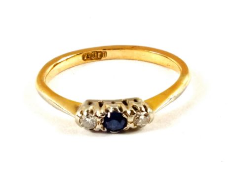 An 18ct Gold, Sapphire and Diamond three stone ring, size K