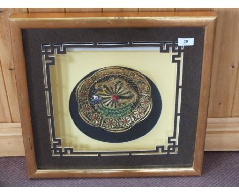 A framed Chinese gilt metal filigree and enamel dragon decorated dish