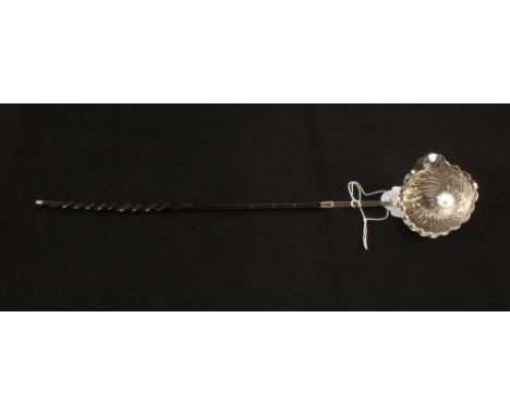 An 18th Century Silver (unmarked) and horn toddy ladle 