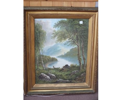 A pair of gilt frame colour prints of lake scenes with fisherman, 23" x 17"