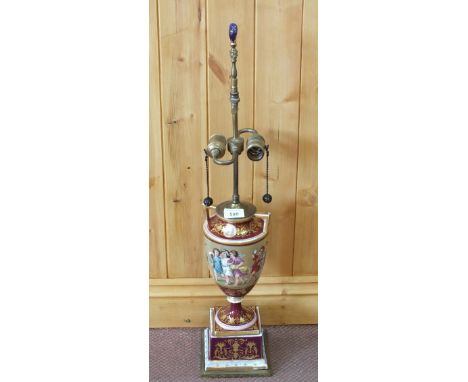 A 19th Century Vienna type porcelain lamp hand painted with children at play