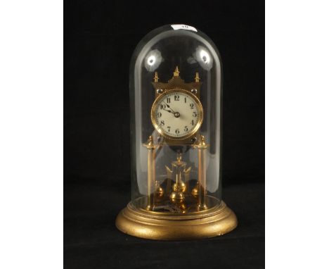 A dome clock and a modern barometer