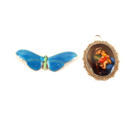A Silver filigree and hand painted porcelain pendant and a Silver and enamel butterfly brooch