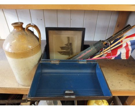 A small tin trunk containing riding crop, parasol handle and other items including a stoneware flagon