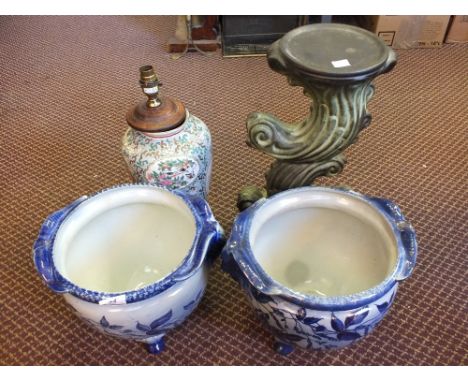 A pair of modern blue and white jardinières (one cracked) and a table lamp and a jardinière stand