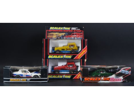 A collection of x4 Hornby made Scalextric slot car racing cars to include models No. C130 Triumph TR7, C119 Porsche Turbo wit