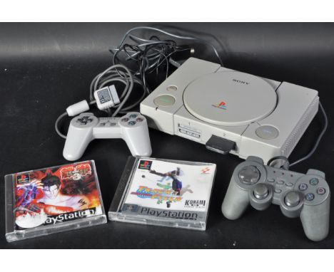 Retro Gaming - an original Sony PlayStation One video games console model no. SCPH-1002, x2 controllers, one being a first pa