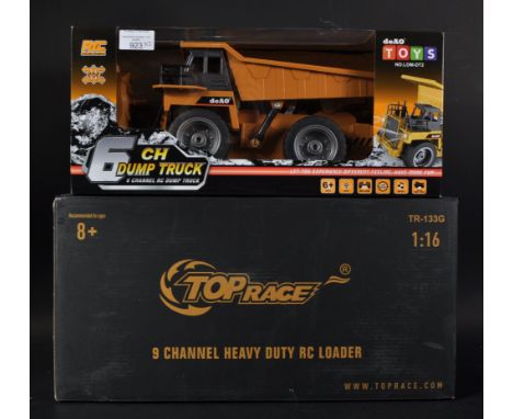 Two boxed 1/16 scale RC Radio Control construction vehicles comprising Top Race made 9 channel Heavy Duty Loader and DeAO Toy