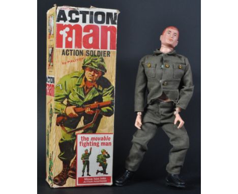 An original circa 1966 Palitoy made Action Man ' Action Soldier ' figure with original box and equipment manuals. The figure 