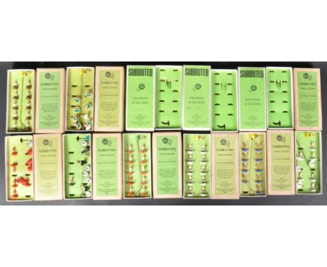 A collection of vintage Subbuteo table top football teams and boxes of various stages of completeness.