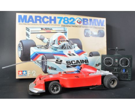 A vintage 1980's Tamiya 1/10 scale RC Radio Control ' March 782 BMW ' F-2 racing car. The model with radio gear and some unus