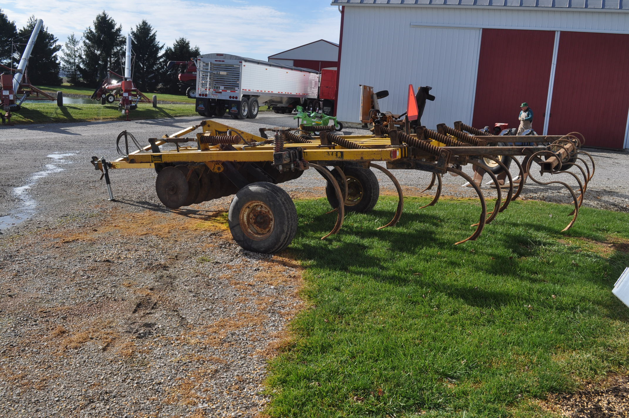Landoll 1200, 7 shank Soil Master disc chisel plow, with rear leveler