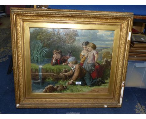 A large Lithograph 1872 in original heavy ornate frame depicting children fishing, initialled.