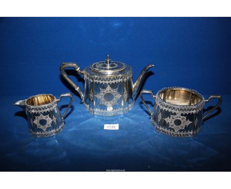 A silver plated Teaset, heavily embossed, including teapot, sucrier and milk jug.