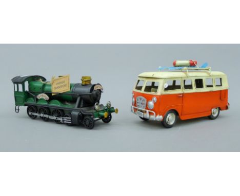 Two tin vehicles, a VW camper and a locomotive. The latter 30 cm long.